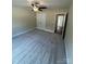 Carpeted bedroom featuring a ceiling fan and double closet at 268 Hatley Ne Cir, Concord, NC 28025