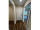 Hallway featuring wood look flooring and white trim at 268 Hatley Ne Cir, Concord, NC 28025