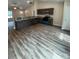 The modern kitchen has sleek dark cabinetry, stainless steel appliances, and a stylish countertop at 268 Hatley Ne Cir, Concord, NC 28025