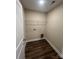 Laundry room with washer and dryer hookups and wood look flooring at 268 Hatley Ne Cir, Concord, NC 28025