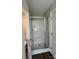 Modern bathroom shower featuring glass door and white tile at 268 Hatley Ne Cir, Concord, NC 28025