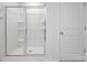 Clean, well-lit shower with built-in shelves, and glass door at 3037 Ora Smith Rd, Lincolnton, NC 28092