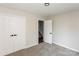 Comfortable bedroom featuring a closet, neutral walls, plush carpeting, and natural light at 3422 Balsam Tree Dr, Charlotte, NC 28269