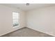 Inviting bedroom with plush carpet, neutral paint, and natural lighting at 3422 Balsam Tree Dr, Charlotte, NC 28269