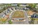 Aerial view of a residential street highlighting well-maintained homes and landscaped yards in a cul-de-sac at 4010 Caymen Bay Ct, Tega Cay, SC 29708