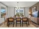 Inviting dining room with modern lighting and stylish decor at 5361 Mint Harbor Way # 0301, Charlotte, NC 28269
