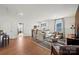 Spacious living room offering ample seating, stylish decor, and abundant natural light at 5361 Mint Harbor Way # 0301, Charlotte, NC 28269