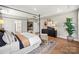 Cozy main bedroom with elegant decor, plenty of natural light, and ample space at 5361 Mint Harbor Way # 0301, Charlotte, NC 28269