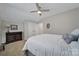 Cozy bedroom with Queen bed, dresser with lamp, closet, and soft carpet at 537 Lincoln Quarters Ln, Fort Mill, SC 29708