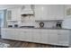 Stylish kitchen with white cabinets, granite countertops, stainless steel appliances, and modern finishes at 537 Lincoln Quarters Ln, Fort Mill, SC 29708
