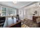 Bright office with hardwood floors, large windows, and classic desk, providing a comfortable work space at 537 Lincoln Quarters Ln, Fort Mill, SC 29708