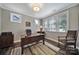 The office has hardwood floors, natural light, and a charming ambiance for a productive workspace at 537 Lincoln Quarters Ln, Fort Mill, SC 29708
