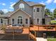Spacious deck featuring outdoor seating and dining areas for relaxation and entertainment at 191 Harris Farm Rd, Mooresville, NC 28115
