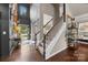 Grand foyer showcasing high ceilings, hardwood floors, and an inviting staircase at 191 Harris Farm Rd, Mooresville, NC 28115
