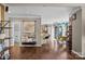Open-concept living area showcases hardwood floors and transitions to a stylish kitchen space at 191 Harris Farm Rd, Mooresville, NC 28115