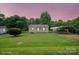Charming home with a well-maintained lawn and a convenient carport at 2321 Cline St, Statesville, NC 28677