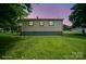 Charming home featuring three bright windows and a spacious green lawn at 2321 Cline St, Statesville, NC 28677