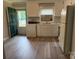 Bright kitchen with updated appliances, cabinets, and a window over the sink at 2321 Cline St, Statesville, NC 28677