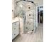 Beautiful bathroom with a glass shower showcasing marble-like tiling, and a pebble floor at 233 Highland Forest Dr, Clover, SC 29710