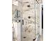 Stunning glass shower featuring sleek black hardware and marble-like tiling and design at 233 Highland Forest Dr, Clover, SC 29710