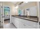 Bathroom featuring double sinks, granite countertops, and white cabinetry at 233 Highland Forest Dr, Clover, SC 29710