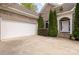 Home's exterior featuring a large attached garage and covered front entry at 233 Highland Forest Dr, Clover, SC 29710