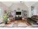 Cozy living room with vaulted ceilings, hardwood floors, and a large decorative rug at 233 Highland Forest Dr, Clover, SC 29710