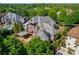 Spacious backyard, outdoor living space, pool, and meticulously landscaped grounds of this luxury home at 300 Eagle Bend Dr, Waxhaw, NC 28173