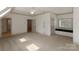 Bright bedroom with neutral carpet, modern ceiling fan, and window bench with storage below at 300 Eagle Bend Dr, Waxhaw, NC 28173