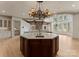Kitchen showcasing an expansive island, stylish pendant lighting, and an open floor plan at 300 Eagle Bend Dr, Waxhaw, NC 28173