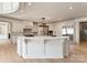 Spacious kitchen featuring a large center island, modern appliances, and custom cabinetry at 300 Eagle Bend Dr, Waxhaw, NC 28173