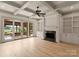 Bright living room with hardwood floors, fireplace, and built-in shelving at 300 Eagle Bend Dr, Waxhaw, NC 28173