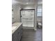 Bathroom with granite vanity, large glass shower, toilet and window allowing natural light at 961 Poplar Forest Rdg, Clover, SC 29710