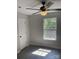 Bedroom featuring neutral walls, hardwood floors, bright window and a white door at 961 Poplar Forest Rdg, Clover, SC 29710