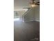 Bright living room featuring new floors, modern ceiling fan, and sliding glass door leading to outdoor balcony at 961 Poplar Forest Rdg, Clover, SC 29710