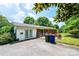 Fenced backyard featuring a paved patio, lush plants, and ample space for outdoor activities at 1008 2Nd Se St, Conover, NC 28613