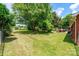 Large, grassy backyard perfect for outdoor activities and enjoying nature at 1008 2Nd Se St, Conover, NC 28613