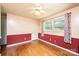 Bedroom with hardwood floors, lots of natural light, and chair-rail molding at 1008 2Nd Se St, Conover, NC 28613