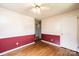 A standard bedroom is displayed, enhanced with chair-rail molding and hardwood floors at 1008 2Nd Se St, Conover, NC 28613