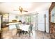 Cozy dining area featuring a round table, a ceiling fan, and sliding glass doors to the outside at 1008 2Nd Se St, Conover, NC 28613
