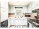 Efficient kitchen featuring light cabinetry, countertop space, and modern appliances at 1008 2Nd Se St, Conover, NC 28613