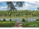 Lush backyard with a path to the river, providing a tranquil setting at 3770 Buck Point Rd, Catawba, NC 28609