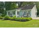 Charming home exterior with a well-manicured lawn and inviting patio areas at 3770 Buck Point Rd, Catawba, NC 28609