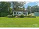 Picturesque home exterior with a spacious lawn and scenic landscaping at 3770 Buck Point Rd, Catawba, NC 28609