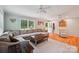 Spacious living room with hardwood floors, large windows, and cozy furniture at 3770 Buck Point Rd, Catawba, NC 28609