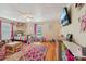 Spacious playroom with hardwood floors, natural light, and ample storage for books and toys at 3770 Buck Point Rd, Catawba, NC 28609