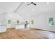 Spacious kitchen with white cabinets, a center island, stainless appliances, and natural light at 7 S Coulter Ave, Newton, NC 28658