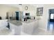 Bright kitchen with stainless steel appliances, granite countertops, and a breakfast bar at 9232 Chislehurst Rd, Mint Hill, NC 28227