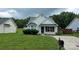 Charming single-Gathering home with a well-manicured lawn and mature landscaping at 3320 Hunting Wood Ct, Gastonia, NC 28052