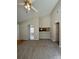 Spacious living room with vaulted ceilings, and neutral carpet and paint at 3320 Hunting Wood Ct, Gastonia, NC 28052